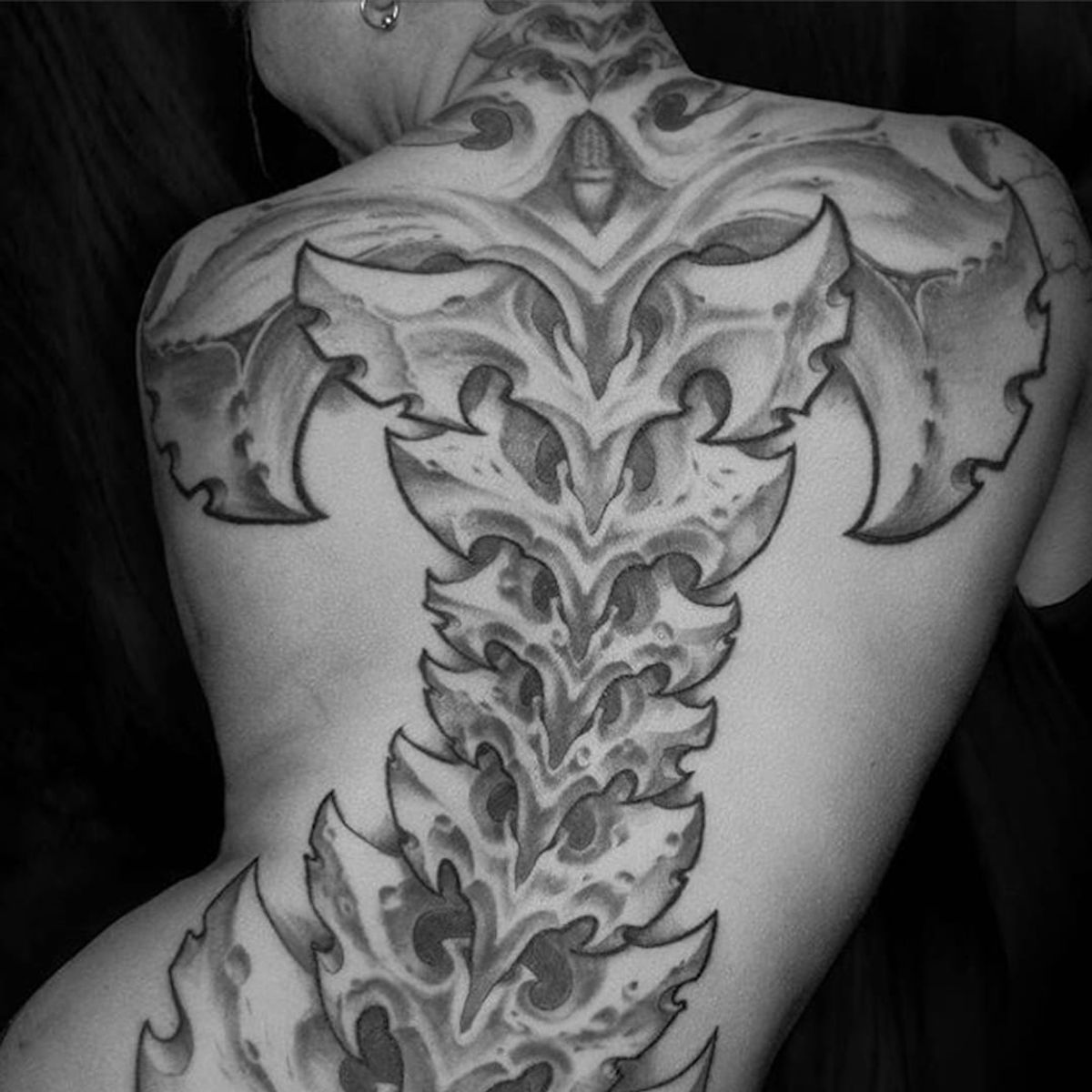 Tattoo uploaded by Hateful Kate • Crazy stonelike spine by Brad Wooten