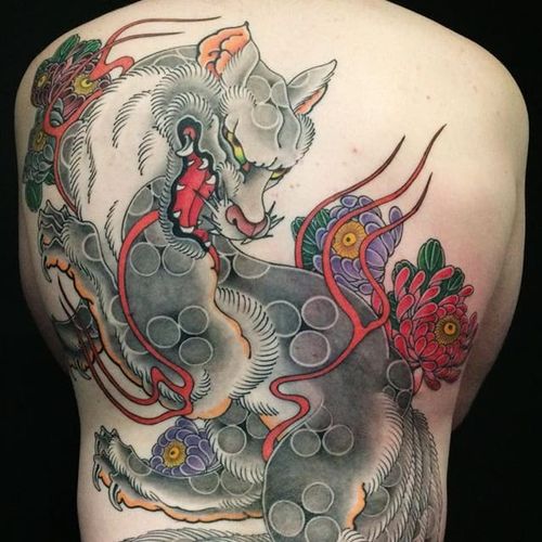 Kitsune and flowers back piece by Adam Kitamoto. #japanese #traditionaljapanese #kitsune #flowers #AdamKitamoto #tententattoo