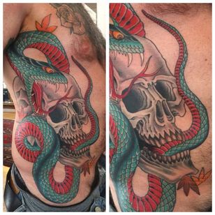 Great healed side piece of a skull and snake. Tattoo by Chris O'Donnell. #ChrisODonnell #TraditionalJapanese #KingsAvenueTattoo #NewYorkTattooer #oriental #easternculture #snake #asianart #skull