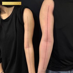 Matching line tattoos by Michelle Santana, West 4 Tattoos, NYC, photo from Instagram #linetattoo #blacktattoos #singlelinetattoo #michellesantana