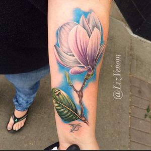 Stunning color realism magnolia tattoo by Liz Venom. #realism #colorrealism #LizVenom #magnolia #flower