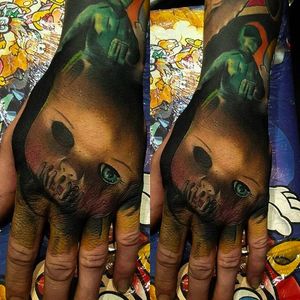 Creepy yet amazing hand tattoo by Craig Cardwell. #CraigCardwell #surreal #painterly #handtattoo #dollhead