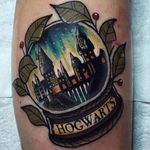 Hogwarts in a snow globe tattoo by Chris Stockings. #snowglobe #glass #harrypotter #hogwarts