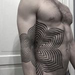 The proportionality and placement on adjacent body parts by Nathan Mould creates a dope optical illusion. #arm #geometric #NathanMould #opticalillusion #ornamental #stippled #torso
