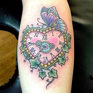 Heart clock tattoo by Caroline Derwent. #clock #heart #butterfly #traditional #CarolineDerwent