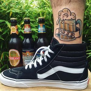 Traditional beer and banner tattoo by Vincent Simon. #traditional #banner #lettering #beer #glass #VincentSimon