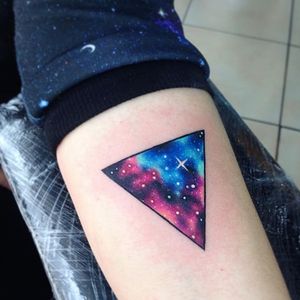 Galaxy Tattoo by Adrian Bascur. One of the many watercolor tattoos by Adrian Bascur with bold lines. #Watercolor #WatercolorTattoos #WatercolorArtists #BoldWatercolor #BestWatercolor #ModernTattoos #ContemporaryTattoos #AdrianBascur