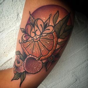 Sparkling citrus and fruit tattoo by Ladi Dada.  #orange #citrus #fruit #neotraditional #LadiDada