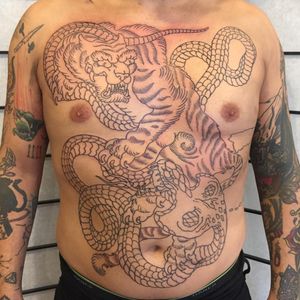 The beginnings of one of John Reardon's massive Japanese tattoos (IG—johnreardontattoos). #cobra #Japanese #JohnReardon #largescale #tiger