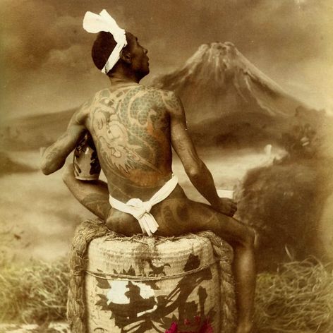 A heavily tattooed man posing for a photo back near the turn of the century. #Irezumi #Japanese #tebori #traditional