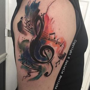 Musical watercolor tattoo by Danielle Merricks. #music #musicnote #watercolor #inksplatter #DanielleMerricks