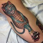 What a purr-fect peanut tattoo by Terry Grow. #neotraditional #cat #costume #peanut #rollerskates #TerryGrow