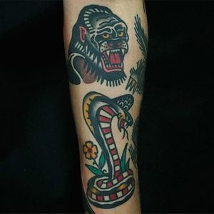 Gorilla and cobra tattoo by Joshua Marks. #JoshuaMarks #ETS #traditionaltattoos #boldtattoos #classic #gorilla #cobra #snake