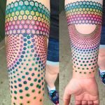 Amazing details on this colorful dotwork tattoo by Tomas Garcia. #tomasgarcia #dotwork #coloredtattoo #forearm