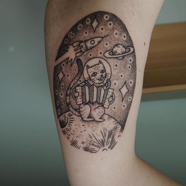 A little astronaut cat done by my ex plus photo of it fresh   rshittytattoos