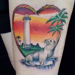 Long Beach lighthouse and sea lion tattoo by Peachy Tattoo. #lighthouse #longbeach #sealion #neotraditional #PeachyTattoo #animal