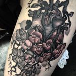 Kelly Violet's more surreal floral tattoos are heart-stopping (IG—kellyviolence). #blacktattoo #blackwork #flowers #kellyviolet