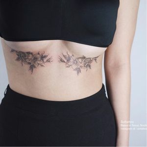 Delicate floral tattoo by Sol Tattoo @soltattoo via instagram. #soltattoo #tattooistsol #floral #floraltattoo #blackwork
