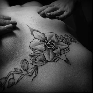 Orchid tattoo by Nazar Butkovski #NazarButkovski #engraving #blackwork #science #orchid