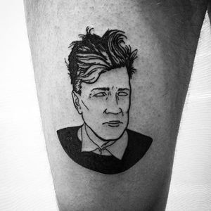 Black lined David Lynch tattoo by Fillipo Garbaccio. #FillipoGarbaccio #filmdirectorstattoo #DavidLynch