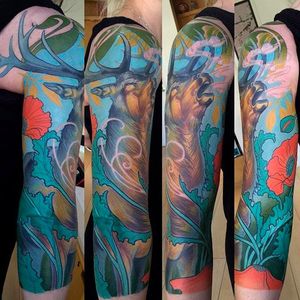 Amazing looking sleeve, with a stag and flowers, tattoo done by Steve Moore
