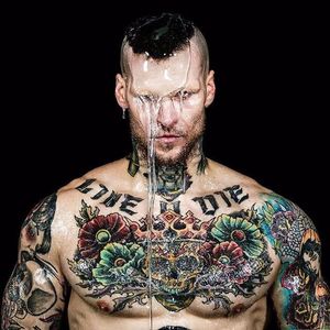 He can even pull off high fashion shots Photo by Mike Ruiz #MarshallPerrin #tattoomodel #tattooedguys #firefighter #traditionaltattoo #tattoododudes #MikeRuiz
