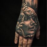 Superb hand tattoo by Christian Boye Larsen #ChristianBoyeLarsen #chicano #realistic #blackandgrey #filigree #portrait