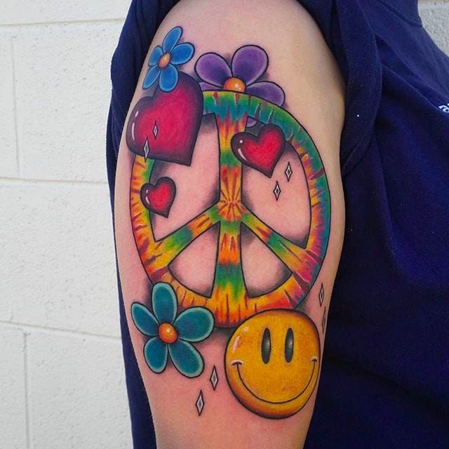 Peace Symbol tattoo floral by Kyle Grover TattooNOW