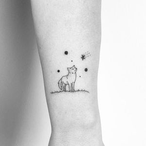 Little Wolf tattoo by Mimi Mine #MimiMine #fineline #linework #dotwork #small #minimal #wolf #dog #coyote #fox #animal #nature #stars #galaxy #tattoooftheday