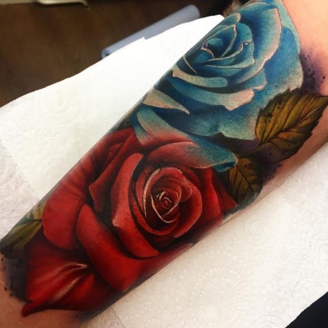 Blue And Red Rose Tattoos On Forearm by Fabio Onorini