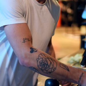 A close up of Sam's tattoos #TattoosAtWork #JoeandtheJuice #SamGlenn #barista #cafe #Copenhagen #mickey #mickeymouse #rose #blackwork #employee #work #blackwork #btattooing #blckwrk #rose #linework #MickeyMouse #minimalist