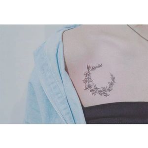 Floral crescent tattoo by Baam. #Baam #TattooerBaam #subtle #microtattoo #southkorean #fineline #floral #flower #crescent