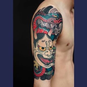 Hannya with snake and maple leaves, half sleeve tattoo by HIRO. #hiro #japanese # traditional # tattoo