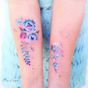 Subtle watercolor tattoo by Pis Saro #PisSaro #vegetal #watercolor #flower #flowers #pairtattoo
