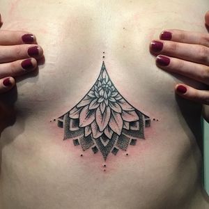 Delicate dotwork dahlia sternum tattoo by Emily Elinski. #dotwork #blackwork #dahlia #sternum #EmilyElinski #floral #dahliaflower #btattooing #blckwrk
