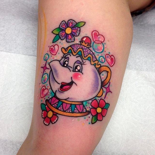 Mrs Potts and Chip tattoo located on the upper arm