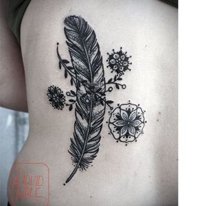 Feather tattoo by David Hale #DavidHale #feather #blackwork #flower #mandala