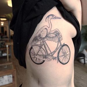 Heron riding a bicycle by Alex Cfourpo. #linework #blackwork #AlexCfourpo #heron #bird #bicycle