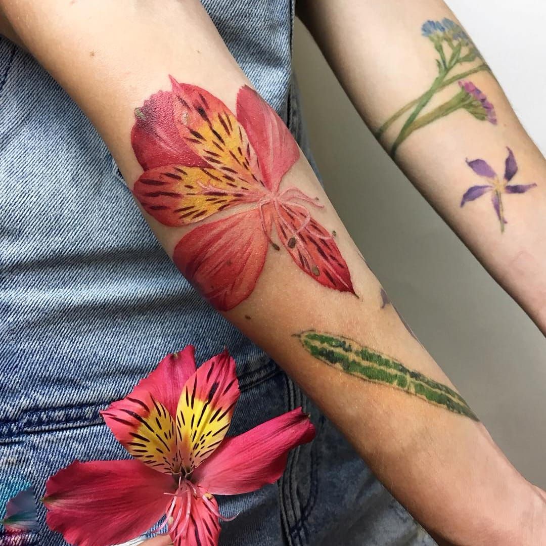 Hip tattoo tropical flowers hummingbird  Flower thigh tattoos Tattoos for  women flowers Tropical flower tattoos