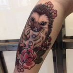 Hedgehog tattoo by Gem Carter. #neotraditional #hedgehog #animal #flower #gemcarter