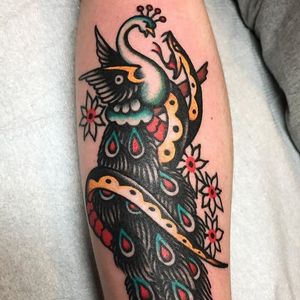 Tattoo uploaded by Ross Howerton • A snake attacking a peacock from ...