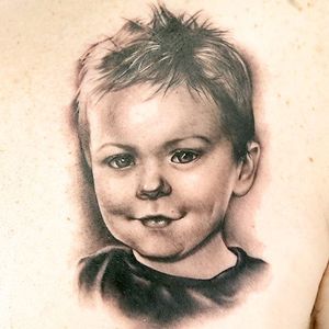 A portrait by Kelly Doty for Ink Master's "Toddler Portrait" challenge (IG—kellydotylovessoup). #blackandgrey #InkMaster #KellyDoty #portraiture