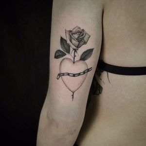 Poetic heart tattoo by Ed Taemets #EdTaemets #blackandgrey #blackwork #heart #rose #chain