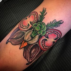 A veggie plate has never looked so moth-like as in this tattoo by Scott Garitson (IG—scottgaritsontattoo). #moth #ScottGaritson #surreal #traditional #vegetables #vibrant