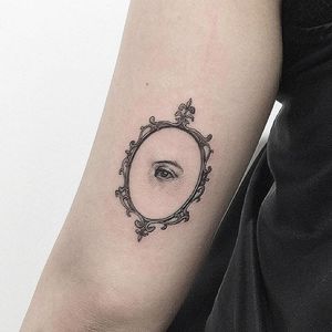 Fine line eye in a frame tattoo by Tattooer Intat. #Intat #TattooerIntat #fineline #southkorean #frame #elegant #eye