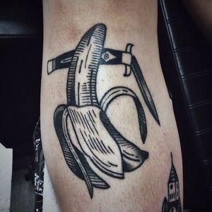 Tattoo by Nate Kemr via Instagram @nkemr #banana #dagger #foldingknife #blackwork #NateKemr