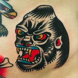 Hardy looking gorilla head tattoo done by Alex Wild. #AlexWild #traditionaltattoo #boldtattoos #gorilla #gorillahead