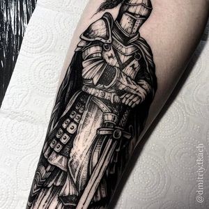 Check out the details on this awesome looking blackwork knight tattoo by Dmitriy Tkach. #DmitriyTkach #knight #blackwork