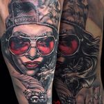 Rad looking black and red portrait of a girl. Tattoo by Martin Kukol. #MartinKukol #realistic #mARTink #shades #girl #blackandred