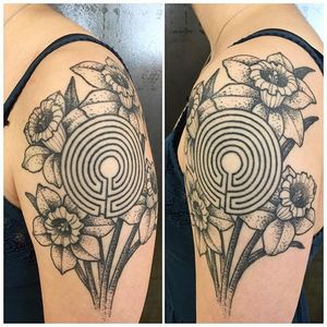 Interesting black and grey dotwork upper arm tattoo by Leah Borkenhagen. #daffodil #dotwork #blackandgrey #flower #LeahBorkenhagen